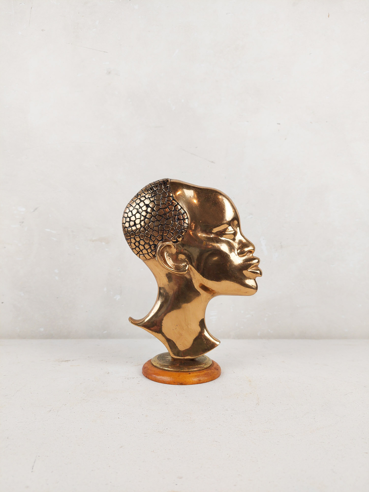 Bronze Hagenauer figurine, head of an African woman - Piet Jonker